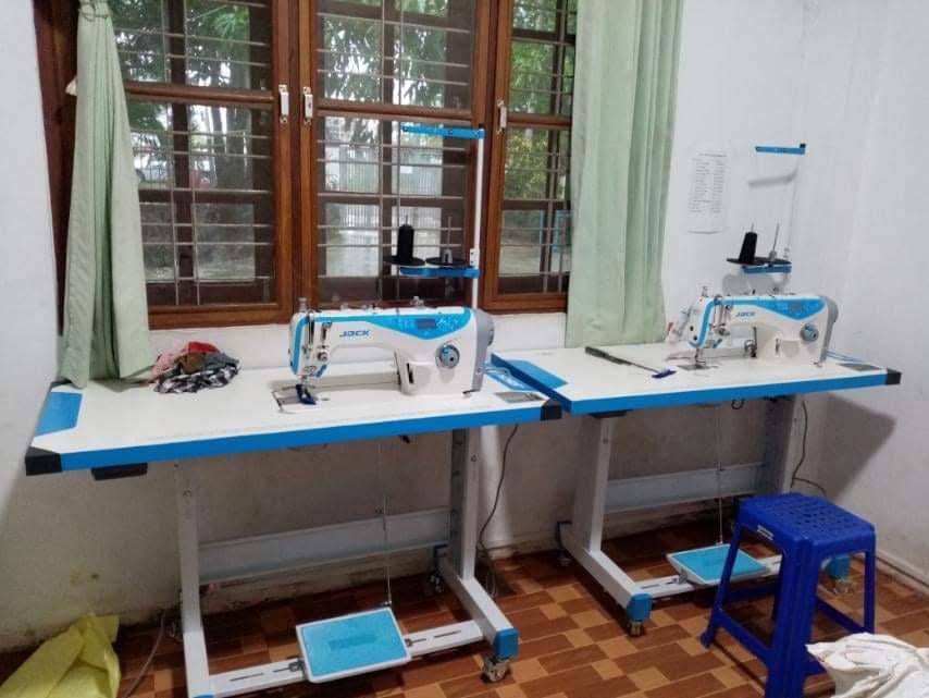 Two sewing machines in a factory in Myanmar