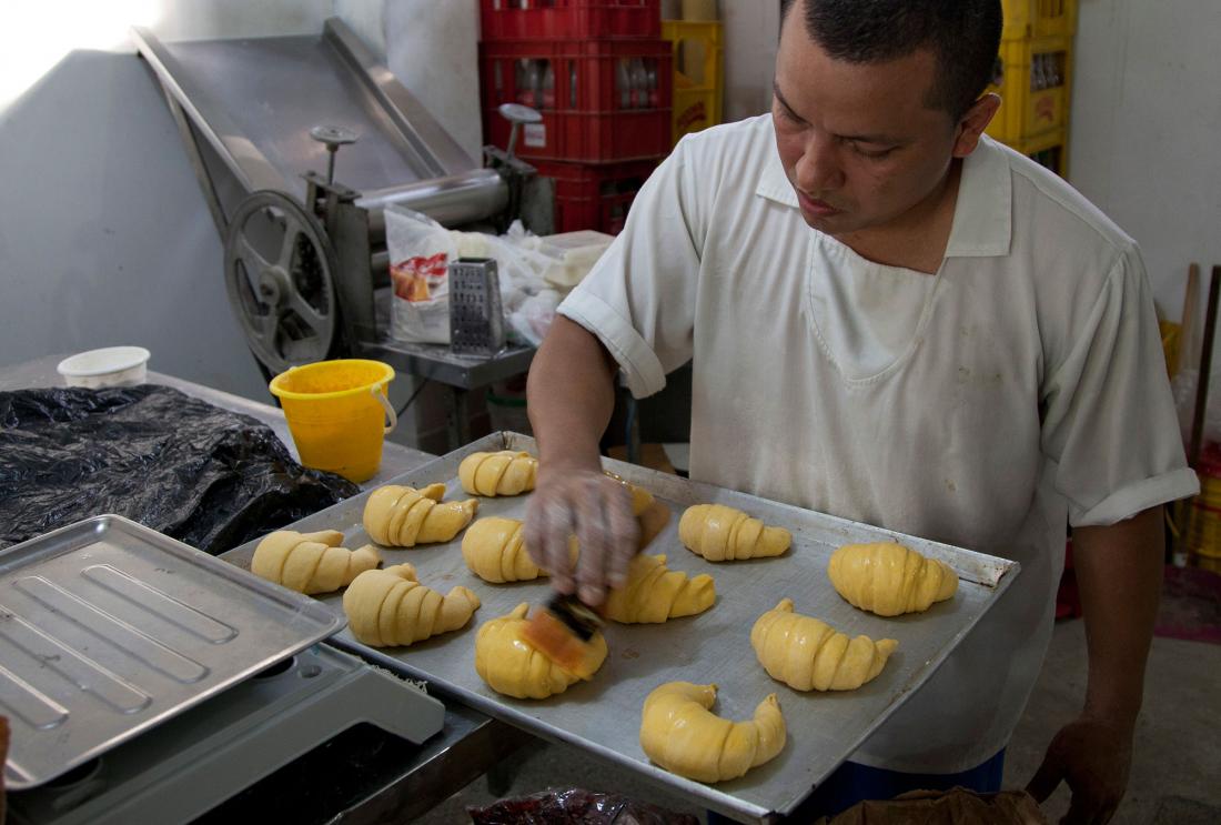 Man working in a bakery near Barranquilla, Colombia.