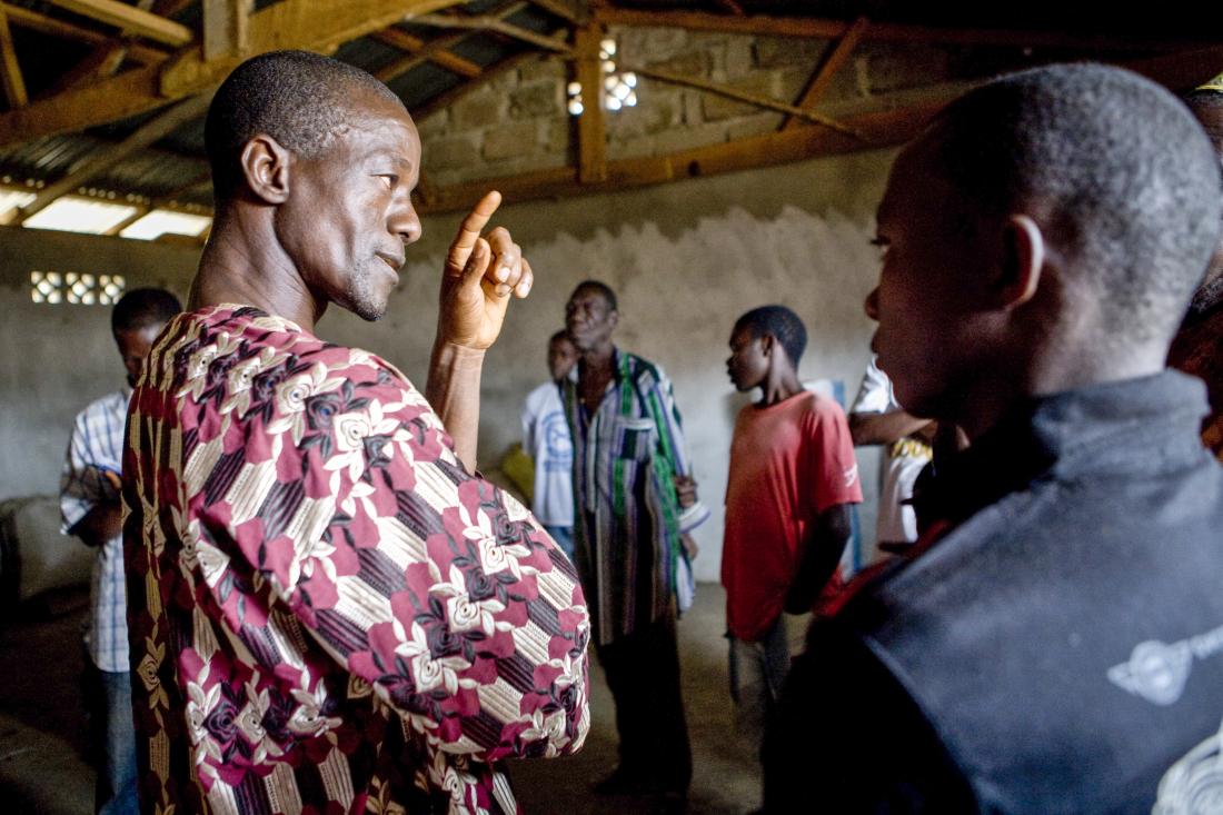 A group of men having a discussion