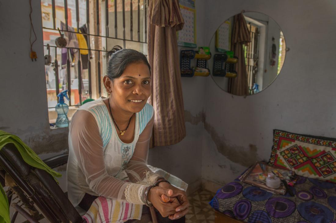 Woman sitting in her beauty parlor