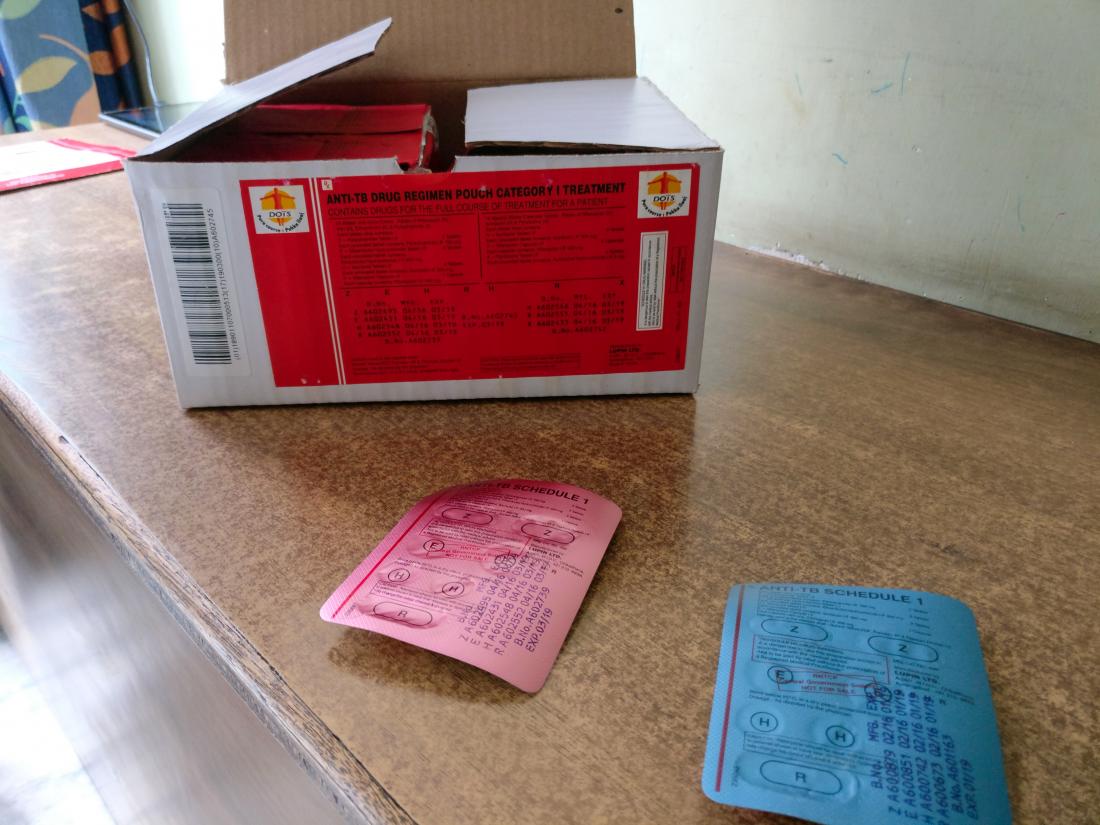 DOTS medication tablets on a table