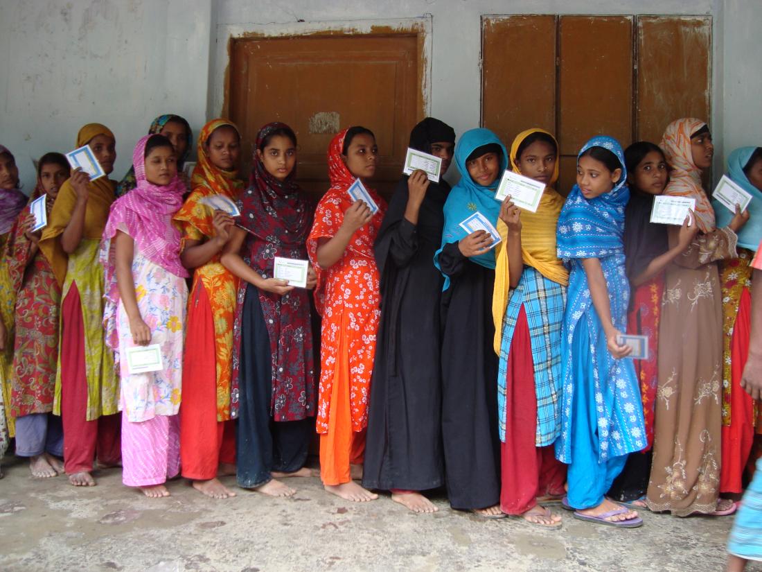 A group of girls with their ration cards in one of the study villages.