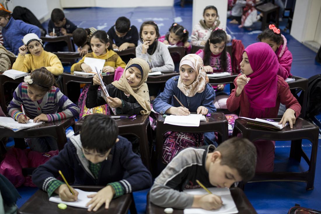 Children studying in a classroom in Istanbul