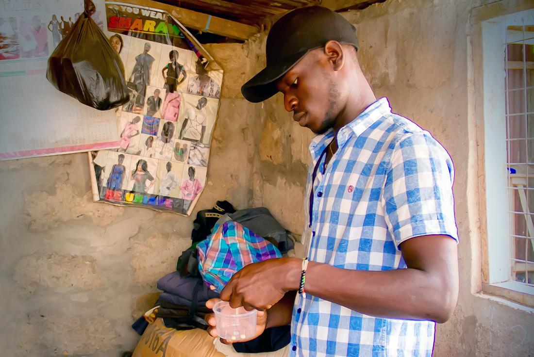 A study participant uses the tablet-based bargaining app