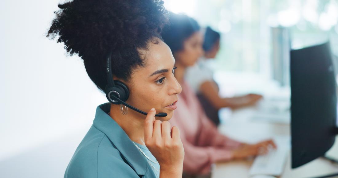 A woman works at call center in customer service