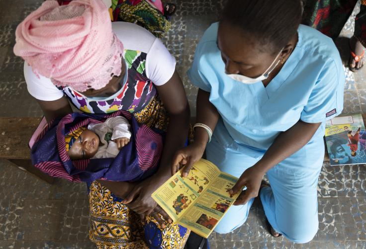 Nurses catering to a child