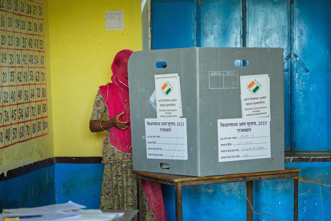 A woman votes at a polling station in Rajasthan, India.