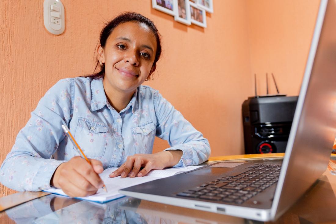 Female entrepreneur working on online training in Ecuador