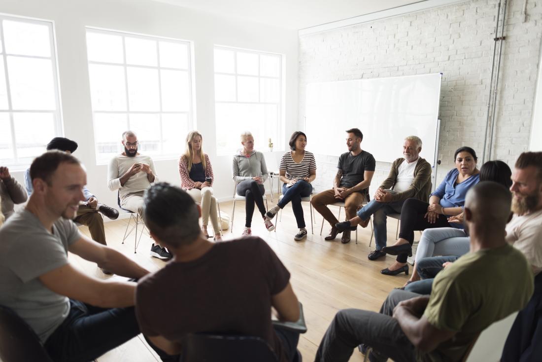 Community members engage in group discussion about policy attitudes in the United States