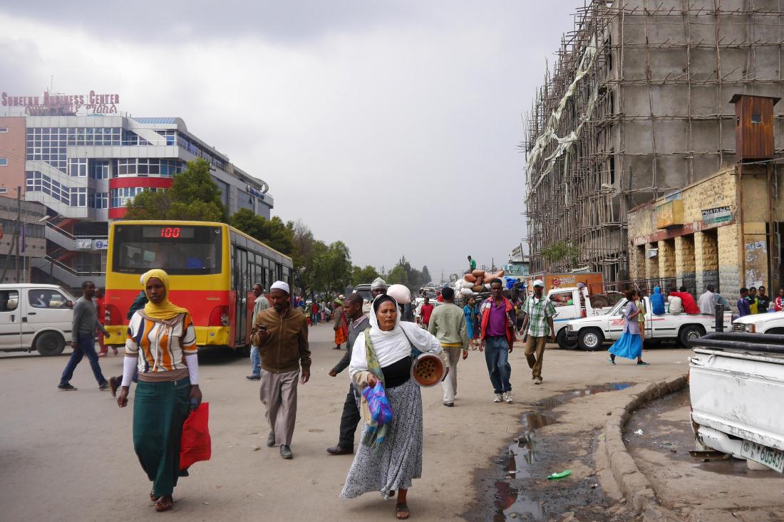 People walking on a street in Addis Ababa, Ethiopia