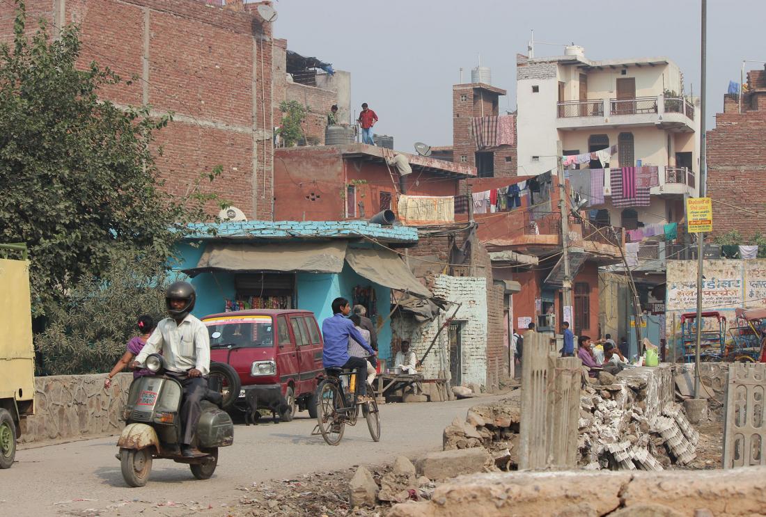 Street with motorcycle and cars