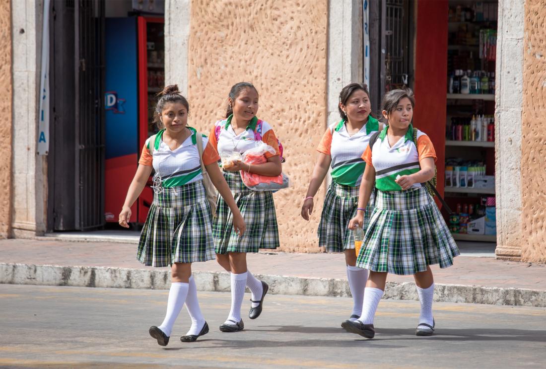 Young girls walking from school