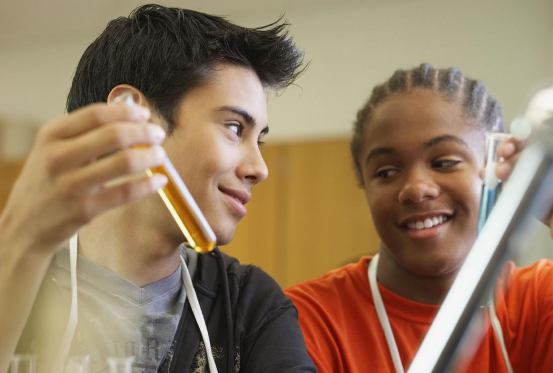 Two students in a science lab.