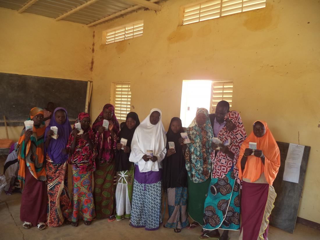 Girls in line to receive their scholarships in rural Niger