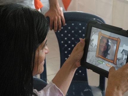 A woman using her tablet in Colombia.