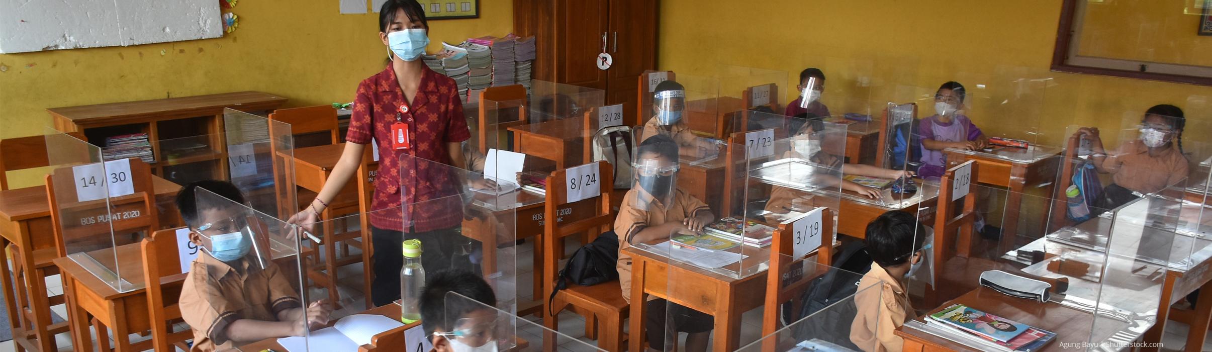 Students and teacher in classroom in Indonesia