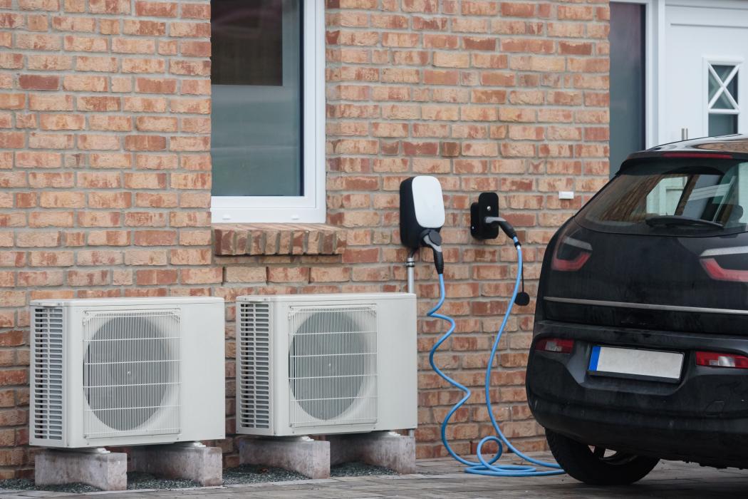 Wall with an electric charging outlet to a car