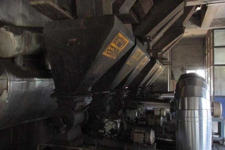 A close-up image of large metal rotary feeders