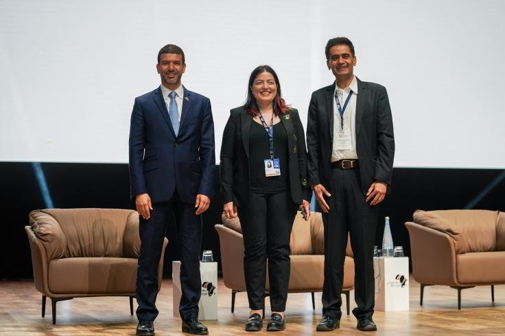 Hicham El Habti, Tavneet Suri, and Iqbal Dhaliwal pose for a picture.