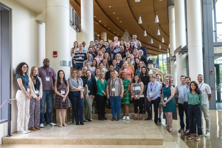 This image is a group photo of participants, lecturers, and J-PAL Staff at the 2023 Evaluating Social Programs course in Cambridge.