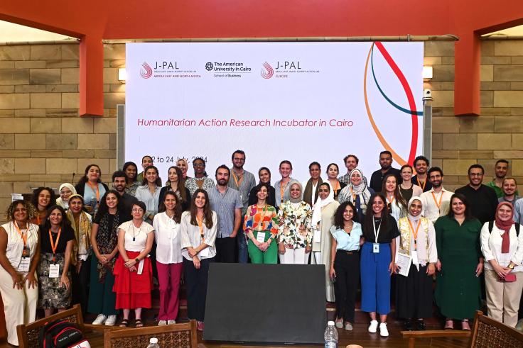 Group photo of J-PAL staff during an event in Cairo