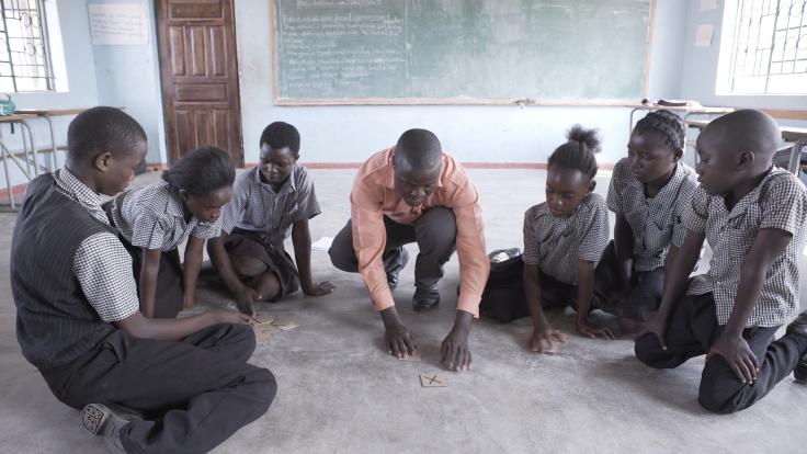 A group of students with a teacher