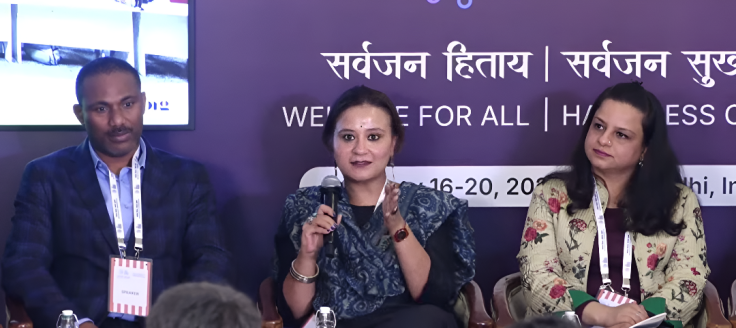 Tithee speaking at the India AI summit