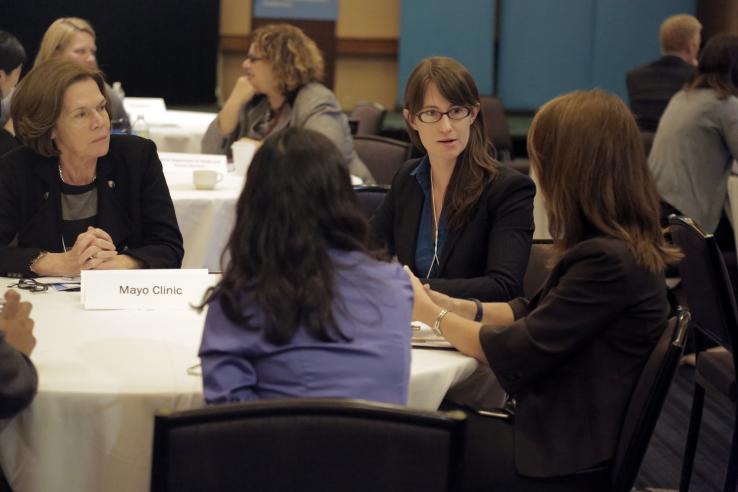 Conference participants discuss work