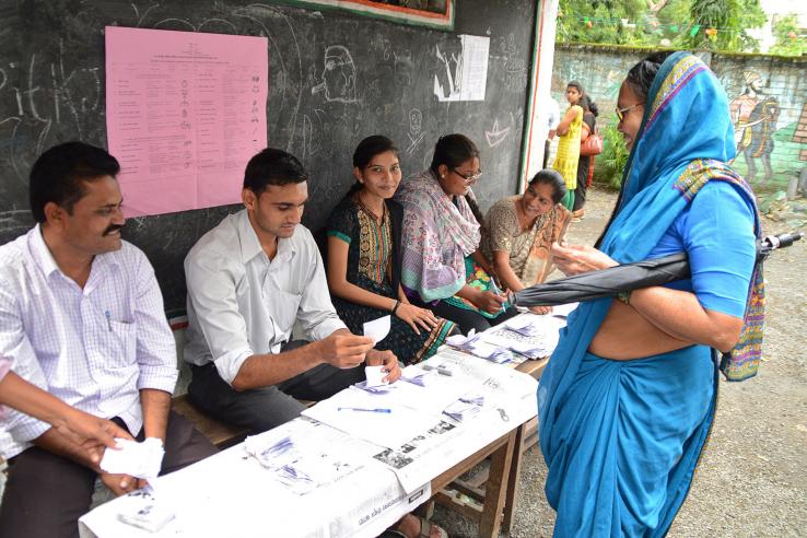 Woman voting in India