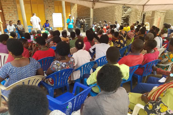 Community members attend a community accountability meeting with their local political leader to discuss health care quality in the Ankole Region of Uganda.