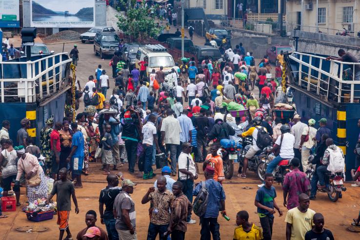 people disembark from the ferry to Freetown port capital of the Sierra Leone