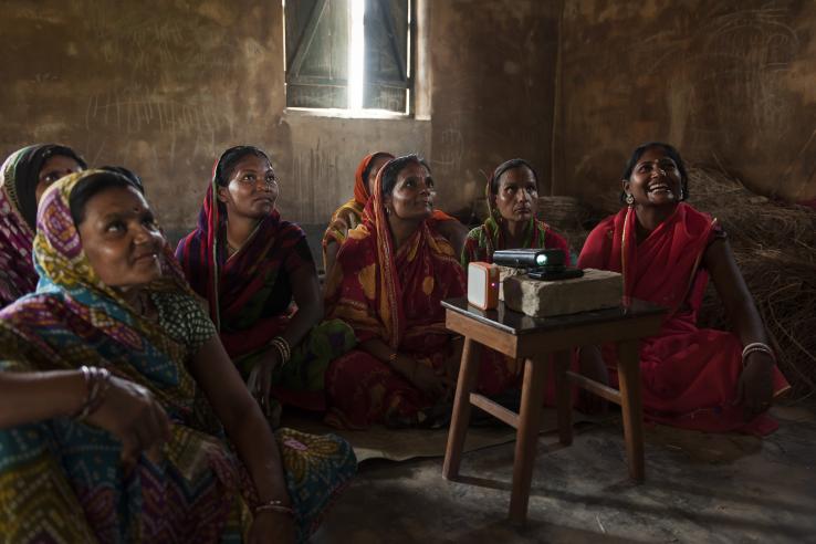 Farmers receiving video training in Bihar, India