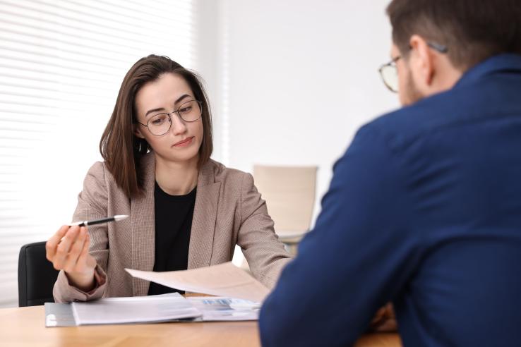 A woman working with her client 
