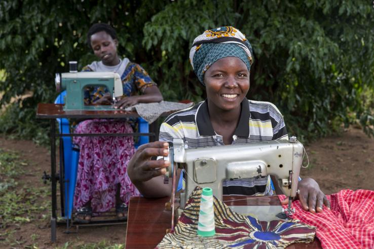 Young women in Uganda tailoring, J-PAL Africa evaluation summary