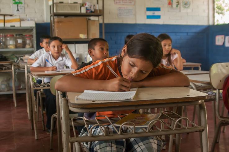 Female secondary school student focuses on education in El Salvador.