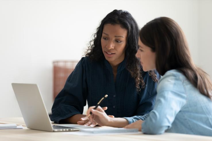 A mentor is coaching a program participant