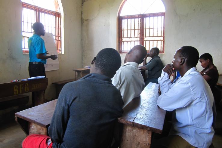 Person teaches a class in Uganda