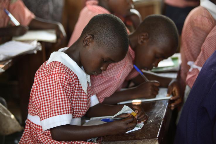 Girls who scored in the top 15 percent on tests received merit-based scholarships, Kenya.