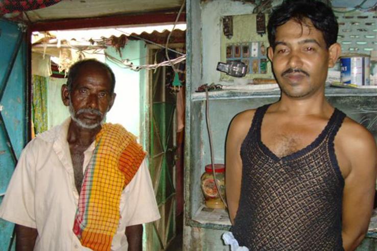 Indian men take a break from work