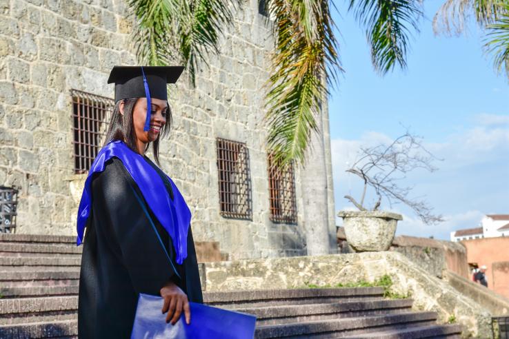 woman wearing graduation outfit