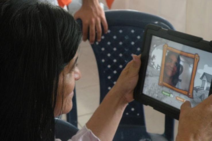 A woman using her tablet in Colombia.