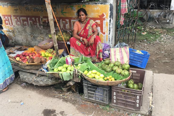 Woman selling produce in Kolkata.