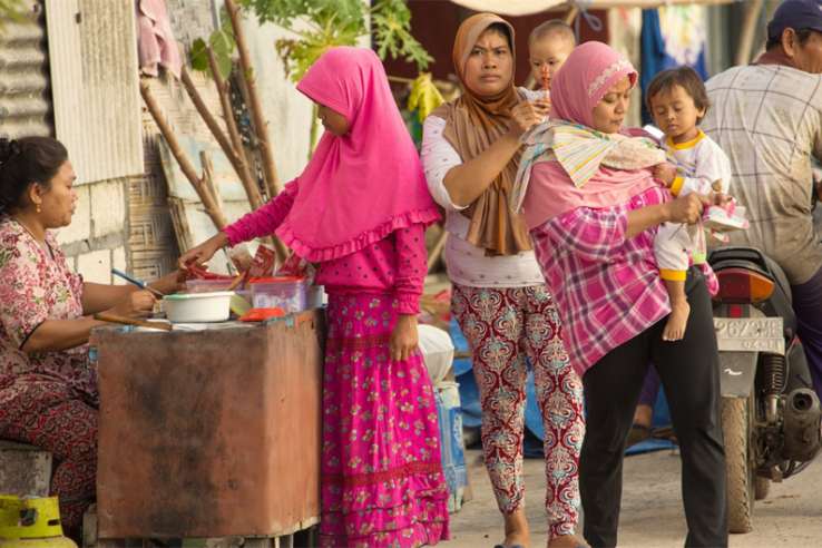 Image: Women at a market in Indonesia.