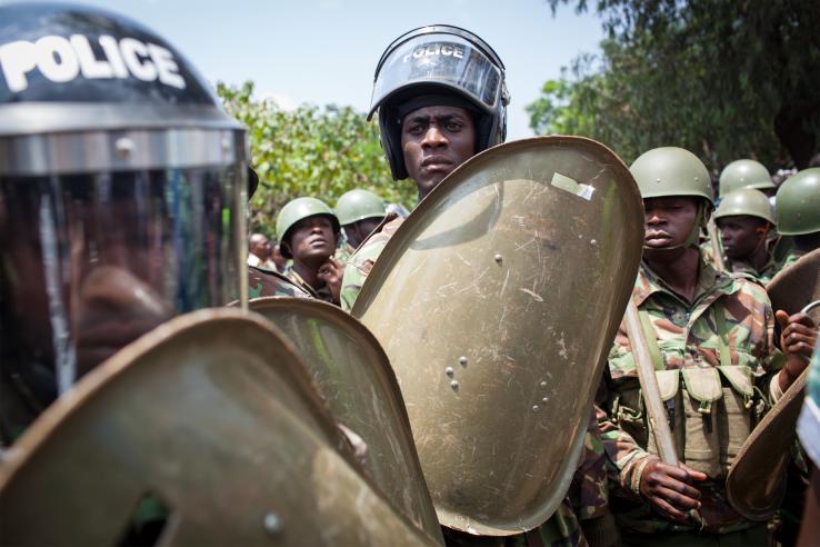 policemen holding shields