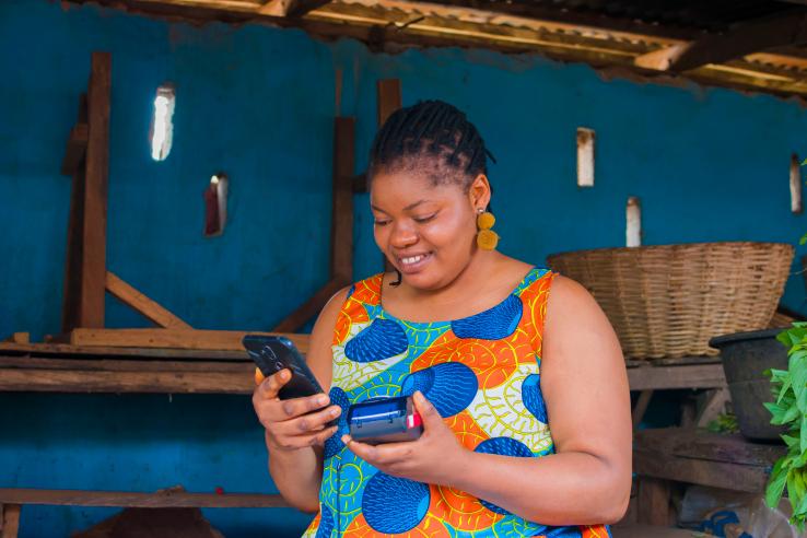 A woman uses her phone