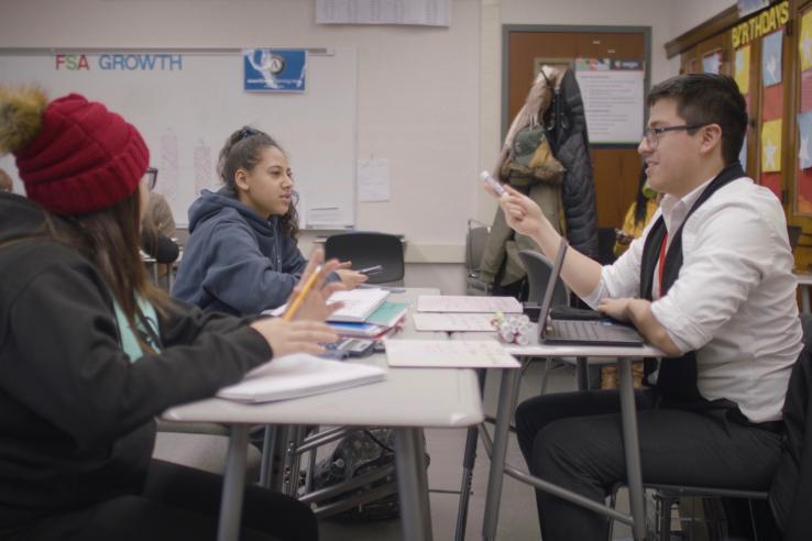 Tutor works with two students.