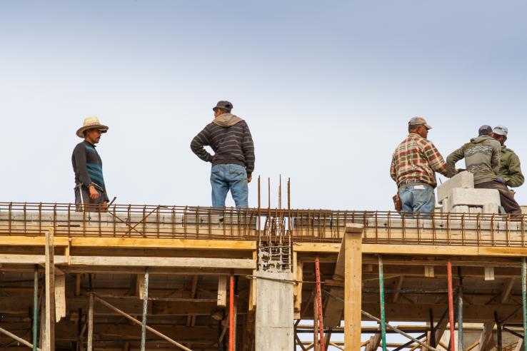 Workers on roof in Morocco