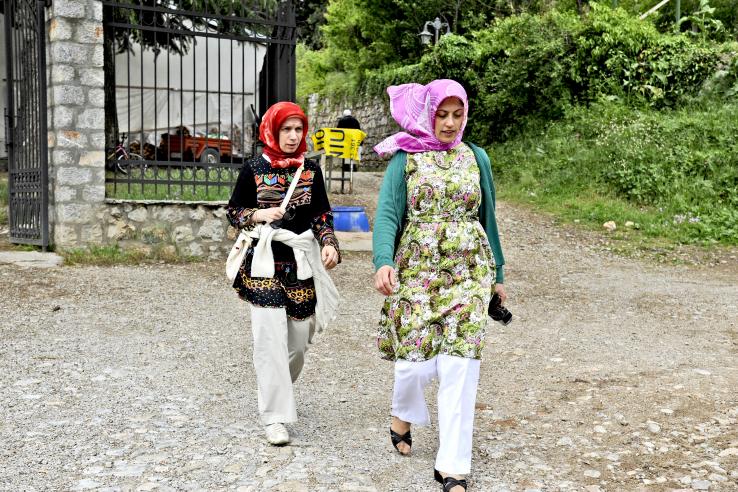 Two women walking outside in Ohrid, North Macedonia 