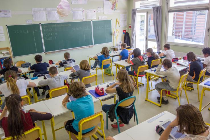 Students using tablets in the classroom