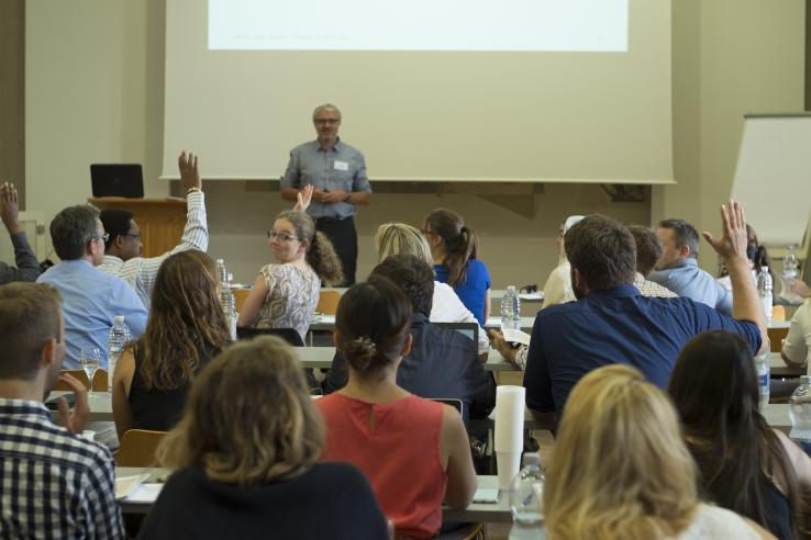 Students and teacher participating in executive education course